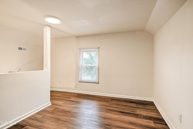 1648 E St, Kingsport, TN 37664 - spare room with wood finished floors and baseboards