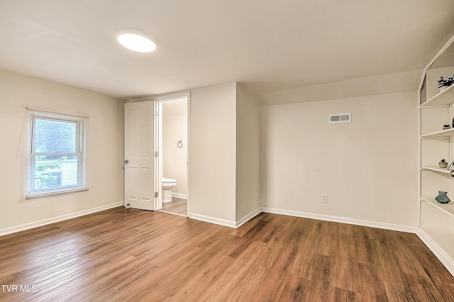 1648 E St, Kingsport, TN 37664 - empty room with wood finished floors