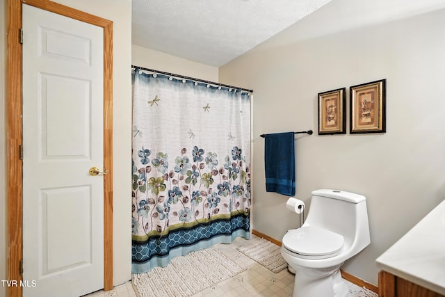 1037 Swift Hollow Rd, Mountain City, TN 37683 - bathroom featuring vanity, a shower with shower curtain, tile patterned floors, and a textured ceiling