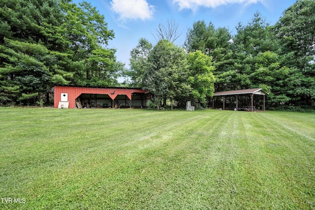 1037 Swift Hollow Rd, Mountain City, TN 37683 - view of green lawn with an outbuilding and an outdoor structure