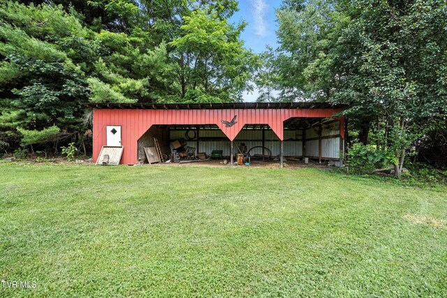 1037 Swift Hollow Rd, Mountain City, TN 37683 - view of pole building featuring a lawn