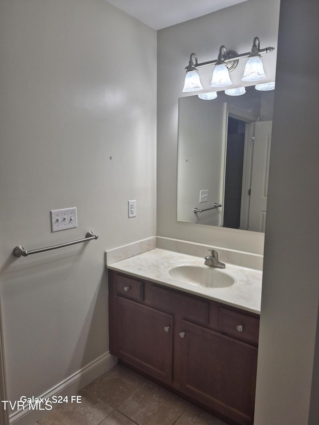 116 Tipton St Unit 209, Johnson City, TN 37604 - bathroom featuring vanity and tile patterned floors