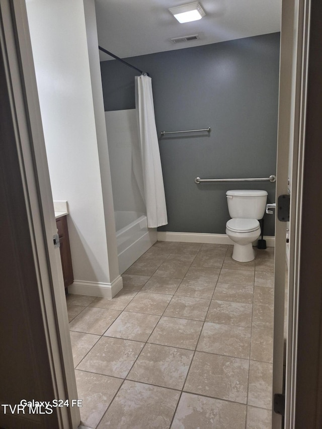 116 Tipton St Unit 209, Johnson City, TN 37604 - bathroom with tile patterned flooring, vanity, and shower / bath combo with shower curtain
