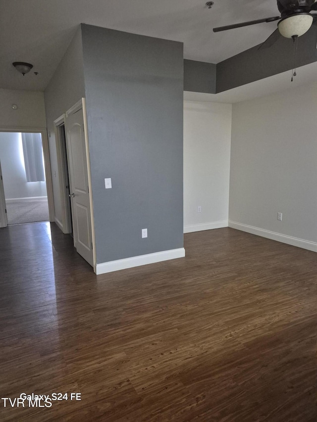116 Tipton St Unit 209, Johnson City, TN 37604 - spare room with ceiling fan and dark wood-type flooring