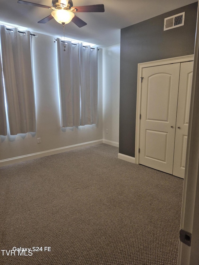 116 Tipton St Unit 209, Johnson City, TN 37604 - spare room featuring carpet flooring and a ceiling fan