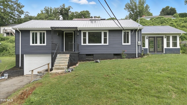3974 Memorial Blvd, Kingsport, TN 37664 - single story home with a garage, a front yard, a metal roof, driveway, and french doors