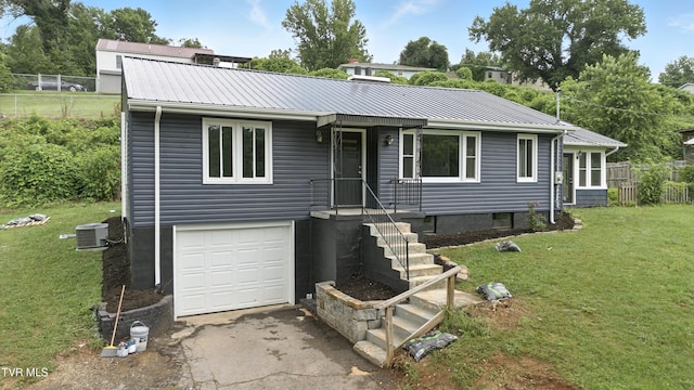 3974 Memorial Blvd, Kingsport, TN 37664 - ranch-style house with a metal roof, an attached garage, and asphalt driveway