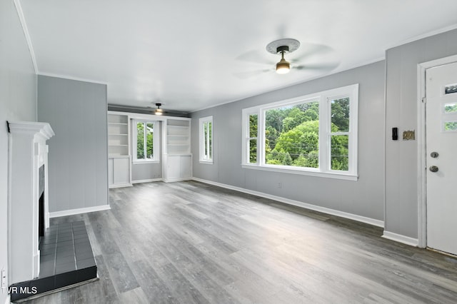 3974 Memorial Blvd, Kingsport, TN 37664 - unfurnished living room with a ceiling fan, a fireplace, ornamental molding, and wood finished floors