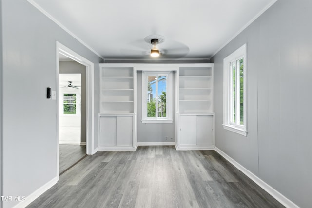 3974 Memorial Blvd, Kingsport, TN 37664 - unfurnished dining area with ornamental molding, ceiling fan, and wood finished floors
