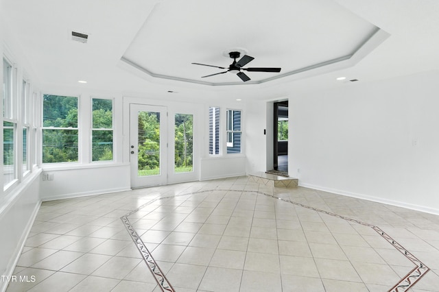 3974 Memorial Blvd, Kingsport, TN 37664 - empty room featuring a raised ceiling, a ceiling fan, light tile patterned flooring, inlaid floor details, and recessed lighting