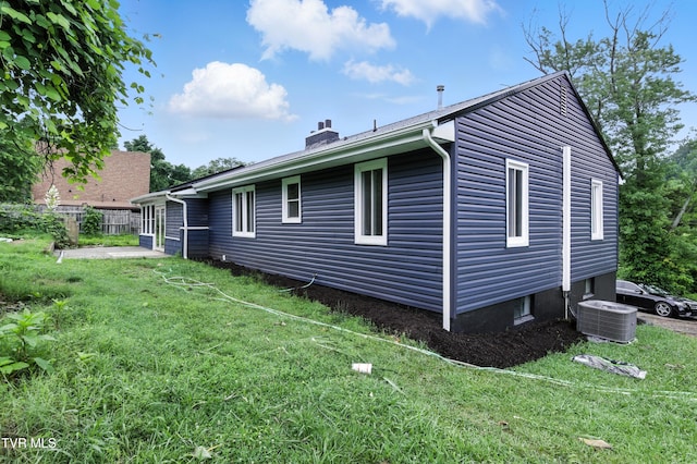 3974 Memorial Blvd, Kingsport, TN 37664 - view of side of home with a chimney and a central air condition unit