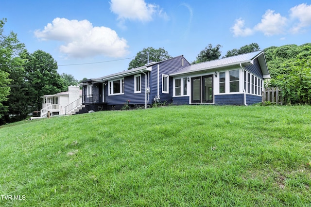 3974 Memorial Blvd, Kingsport, TN 37664 - view of front facade featuring a sunroom, a front lawn, and a metal roof