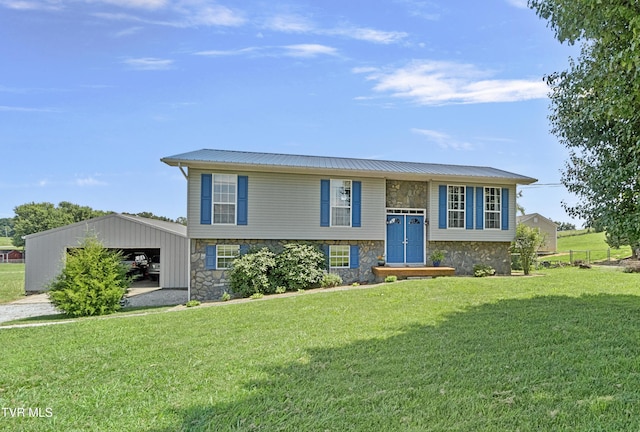 3500 Old Stage Rd, Chuckey, TN 37641 - bi-level home featuring stone siding, a front lawn, an outbuilding, and a garage
