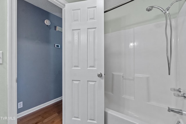 3500 Old Stage Rd, Chuckey, TN 37641 - full bath with washtub / shower combination and wood finished floors