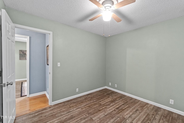 3500 Old Stage Rd, Chuckey, TN 37641 - spare room featuring wood finished floors, a textured ceiling, and a ceiling fan