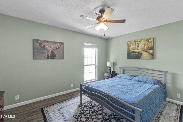 3500 Old Stage Rd, Chuckey, TN 37641 - bedroom with wood finished floors, a textured ceiling, and ceiling fan