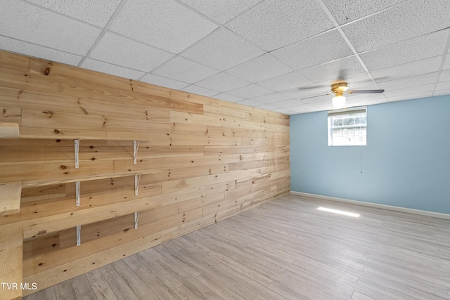 3500 Old Stage Rd, Chuckey, TN 37641 - unfurnished room with wooden walls, a paneled ceiling, and wood finished floors