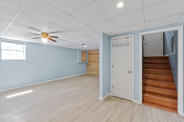 3500 Old Stage Rd, Chuckey, TN 37641 - below grade area featuring a paneled ceiling, light wood-type flooring, stairs, and ceiling fan