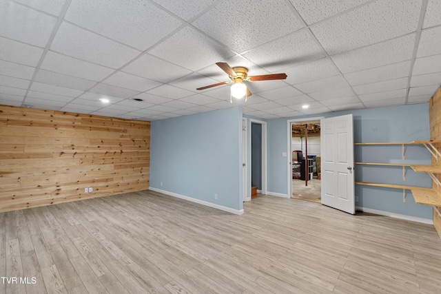 3500 Old Stage Rd, Chuckey, TN 37641 - finished basement with a ceiling fan, light wood-style flooring, and a drop ceiling
