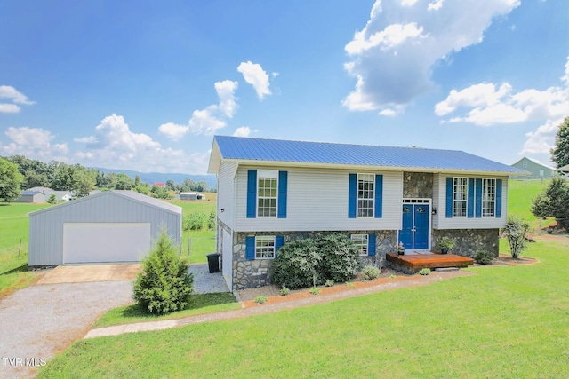 3500 Old Stage Rd, Chuckey, TN 37641 - bi-level home featuring stone siding, a garage, an outbuilding, a front lawn, and a metal roof