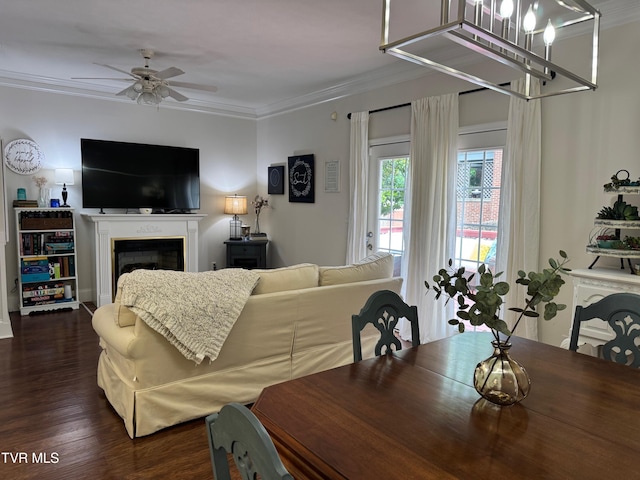 700 NW The Terrace St Unit D, Norton, VA 24273 - dining space with a fireplace, dark wood finished floors, a ceiling fan, and crown molding