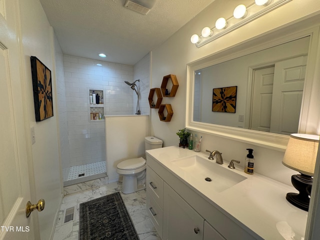 700 NW The Terrace St Unit D, Norton, VA 24273 - full bathroom featuring marble finish flooring, vanity, a tile shower, a textured ceiling, and recessed lighting