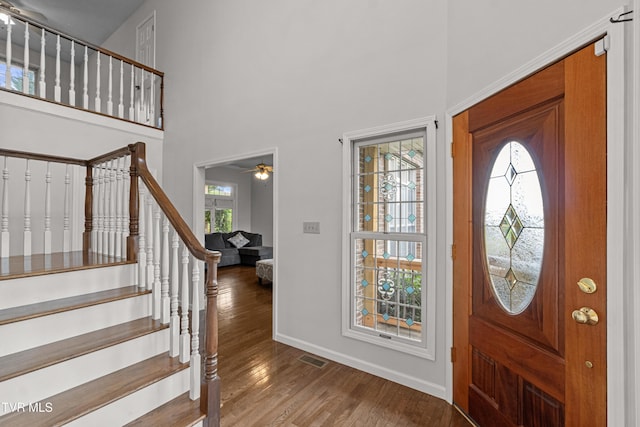 945 Dashaway Rd, Chuckey, TN 37641 - foyer with wood finished floors, a towering ceiling, stairs, and ceiling fan