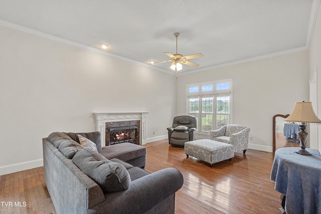 945 Dashaway Rd, Chuckey, TN 37641 - living area with a ceiling fan, hardwood / wood-style flooring, ornamental molding, and a high end fireplace