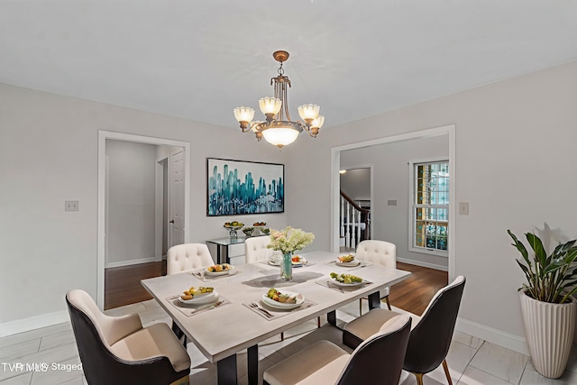945 Dashaway Rd, Chuckey, TN 37641 - dining area with stairs and a chandelier