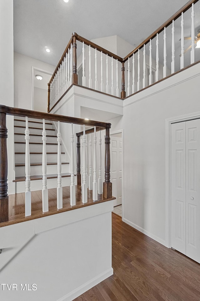 945 Dashaway Rd, Chuckey, TN 37641 - staircase featuring wood finished floors, recessed lighting, and a high ceiling