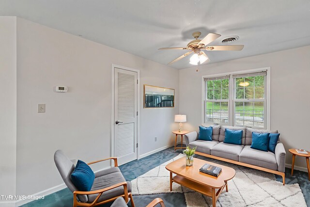 945 Dashaway Rd, Chuckey, TN 37641 - carpeted living area with baseboards and ceiling fan
