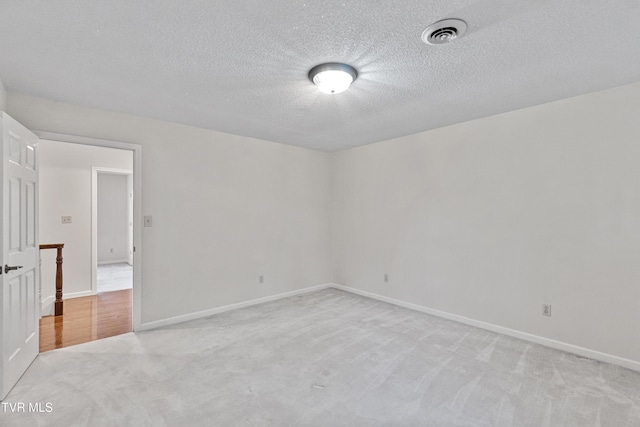 945 Dashaway Rd, Chuckey, TN 37641 - empty room featuring light colored carpet and a textured ceiling