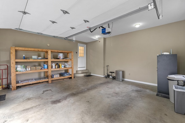 945 Dashaway Rd, Chuckey, TN 37641 - garage with a garage door opener and baseboards