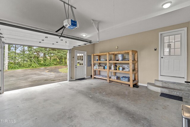 945 Dashaway Rd, Chuckey, TN 37641 - garage with a garage door opener and electric panel