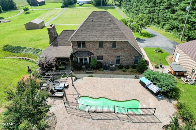 945 Dashaway Rd, Chuckey, TN 37641 - back of property with a chimney, a patio, brick siding, stairway, and roof with shingles