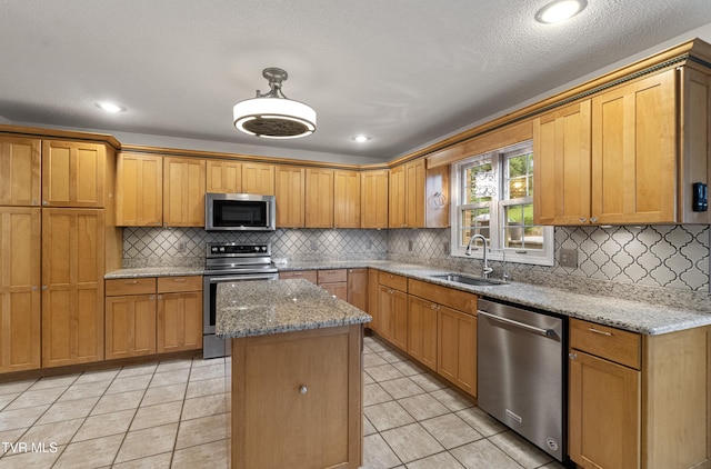 945 Dashaway Rd, Chuckey, TN 37641 - kitchen featuring stainless steel appliances, a kitchen island, backsplash, and light tile patterned floors