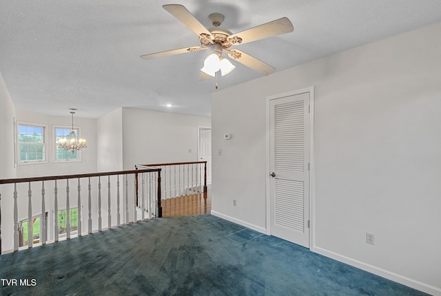 945 Dashaway Rd, Chuckey, TN 37641 - carpeted empty room featuring a chandelier, ceiling fan, and a textured ceiling