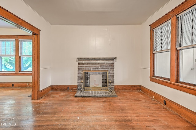 1149 Moorland Ave, Bristol, VA 24201 - unfurnished living room with wood-type flooring, a fireplace, and ornamental molding