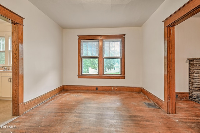 1149 Moorland Ave, Bristol, VA 24201 - unfurnished room featuring hardwood / wood-style floors and a sink