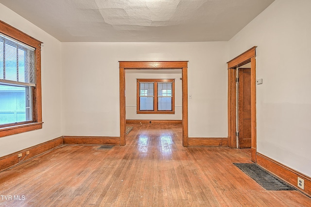 1149 Moorland Ave, Bristol, VA 24201 - empty room with hardwood / wood-style flooring and healthy amount of natural light