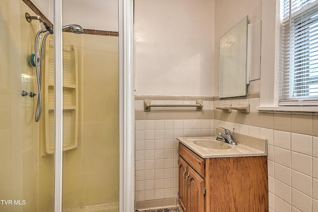 1149 Moorland Ave, Bristol, VA 24201 - full bath with a stall shower, vanity, tile walls, and a wainscoted wall