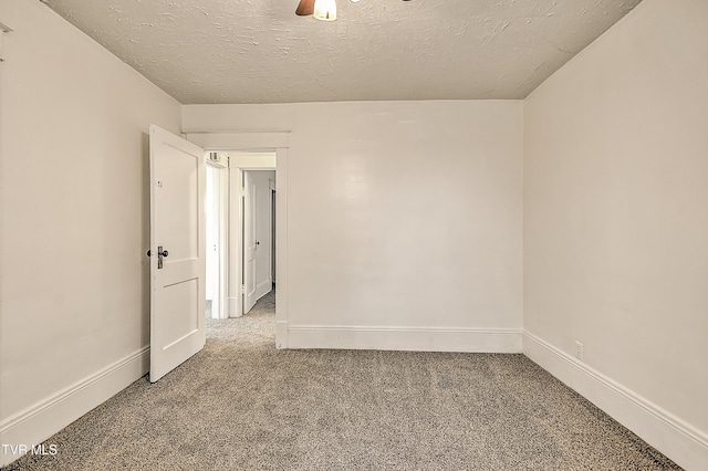 1149 Moorland Ave, Bristol, VA 24201 - carpeted empty room featuring a textured ceiling and a ceiling fan