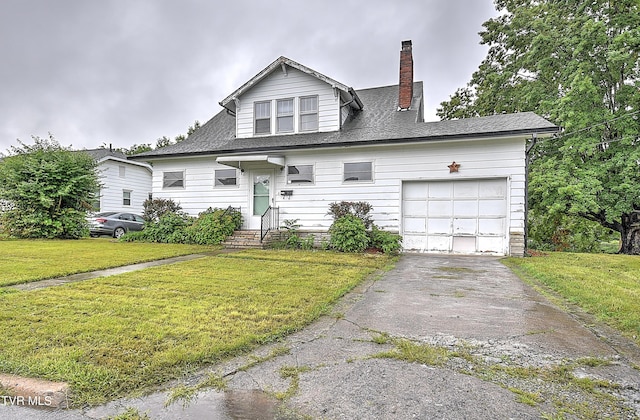 1149 Moorland Ave, Bristol, VA 24201 - view of front of property featuring a chimney, a front yard, asphalt driveway, a garage, and a shingled roof