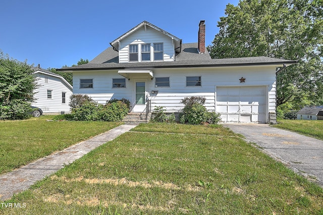 1149 Moorland Ave, Bristol, VA 24201 - view of front of house featuring a chimney, a front lawn, driveway, and an attached garage