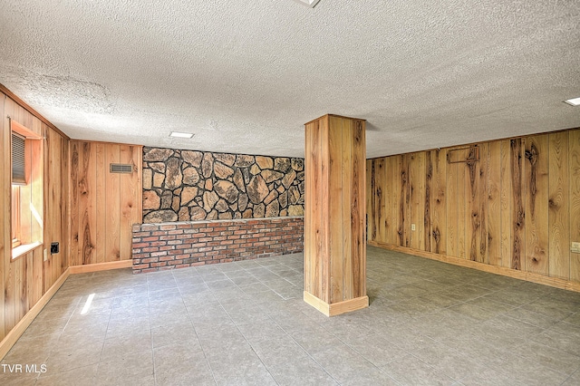 307 Tween Hills Rd, Bristol, TN 37620 - finished basement with wooden walls and a textured ceiling