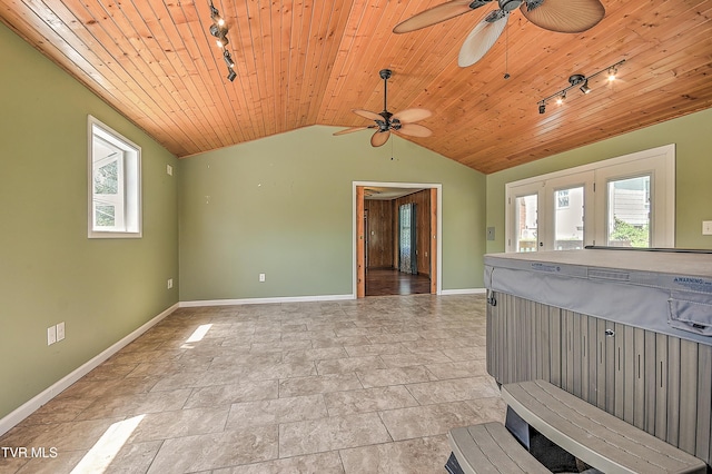 307 Tween Hills Rd, Bristol, TN 37620 - unfurnished room featuring track lighting, healthy amount of natural light, ceiling fan, wooden ceiling, and vaulted ceiling