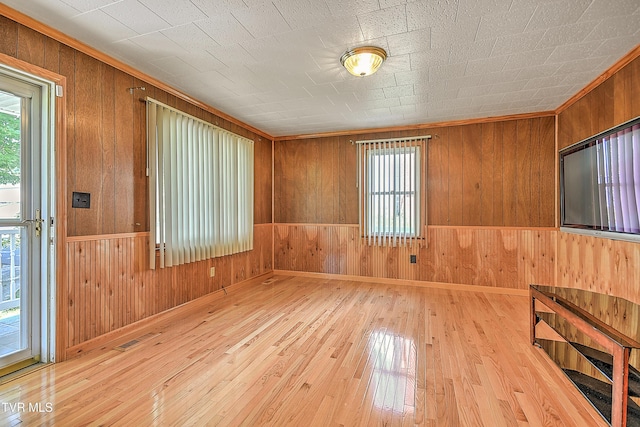 307 Tween Hills Rd, Bristol, TN 37620 - unfurnished room featuring plenty of natural light, wood walls, and hardwood / wood-style flooring