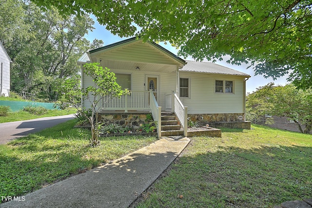 307 Tween Hills Rd, Bristol, TN 37620 - bungalow with a front lawn and a metal roof