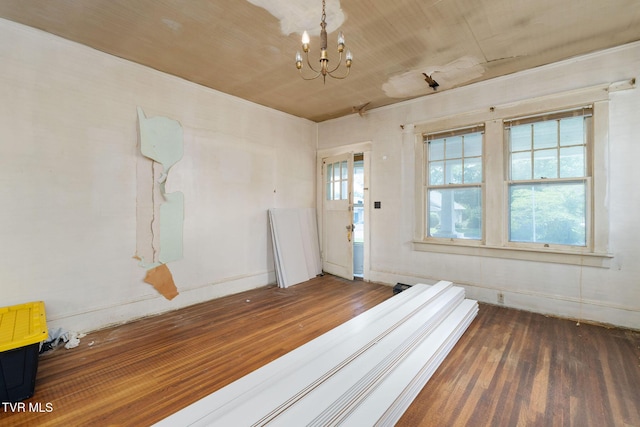 1411 E Unaka Ave, Johnson City, TN 37601 - spare room with wood finished floors and a chandelier