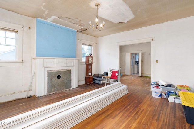 1411 E Unaka Ave, Johnson City, TN 37601 - living area with wood finished floors, a chandelier, and a premium fireplace